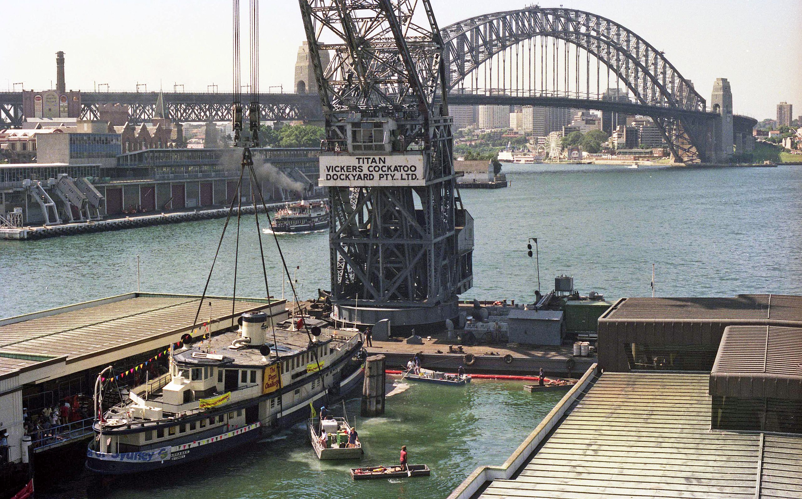 The Karrabee being refloated by a Titan Crane at Circular Quay